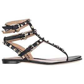 Valentino Garavani-Valentino Garavani Sandálias rasas Rockstud Thong em couro preto-Preto