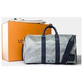 Louis Vuitton-Bolsa Keepall LOUIS VUITTON em plástico prateado - 101901-Prata