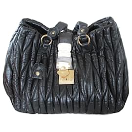 Miu Miu-Quilted bag, black leather.-Black
