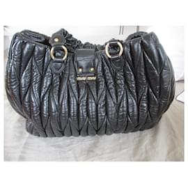 Miu Miu-Quilted bag, black leather.-Black