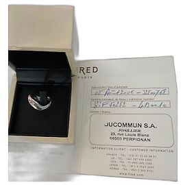 Signed ring from Maison Fred, white gold tumultuous collection Silvery
