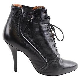 Givenchy Botas de couro com cadarços Preto