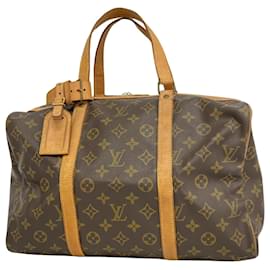 Louis Vuitton-Louis Vuitton Sac souple-Castaño