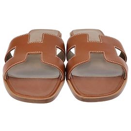 Hermès Hermes Gold Oran Flat Slides Golden