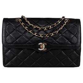 Chanel-Borsa con patta media foderata Chanel in pelle di agnello trapuntata oro 24 carati bicolore-Nero