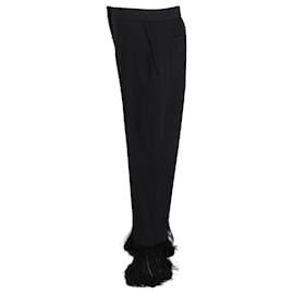 Burberry-Burberry – Schmal geschnittene Hose aus schwarzer Wolle mit Fransen-Schwarz