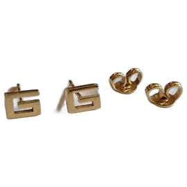 Pendientes Gucci G en oro amarillo 750/000 Dorado