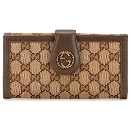 Gucci-Portafoglio bifold in tela GG intrecciata con borchie Gucci marrone-Marrone