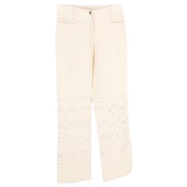 Dolce & Gabbana Pantalones con aberturas de encaje y flores en lino blanco Blanco Crudo