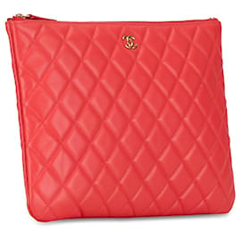 Chanel-Bolso de mano O Case de piel de cordero acolchado Chanel rojo-Roja