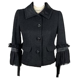 Chanel-Nouvelle veste en tweed noir avec boutons en camélia CC.-Noir