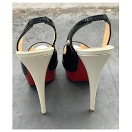 Christian Louboutin-Sandalias-Negro