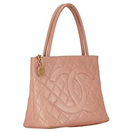 Chanel-Bolso tote de cuero Chanel CC Caviar Medallion Tote en buen estado-Otro