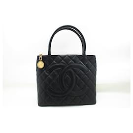 Chanel-Bolso de hombro CHANEL con medallón dorado de caviar, bolso de compras Grand Shopping en negro.-Negro