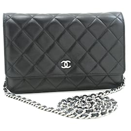 Chanel-Bolso de hombro CHANEL Black Classic Wallet On Chain WOC de piel de cordero con detalles en plata.-Negro