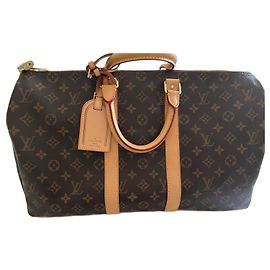 Louis Vuitton Bolsa Keepall de Tecido Outro