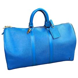 Louis Vuitton-Sacs de voyage-Bleu,Bijouterie dorée