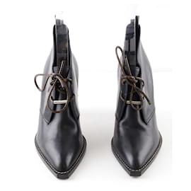 Louis Vuitton-Bottes à lacets en cuir-Noir
