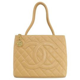 Chanel Medaillon Beige