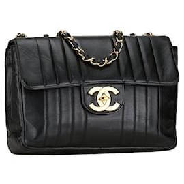 Chanel-Chanel CC Vertical Quilt Leather Flap Bag Leather Shoulder Bag in Good condition-Other