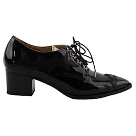Chanel stringate in pelle Nero
