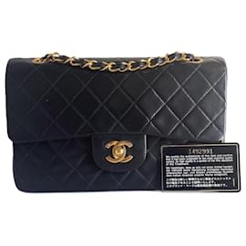 Chanel-Chanel handbag with double flap in black leather, 23 cm, gold plated-Black