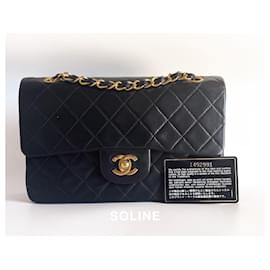 Chanel-Chanel handbag with double flap in black leather, 23 cm, gold plated-Black