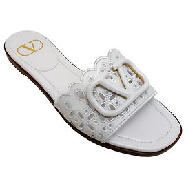 Sandálias deslizantes com ilhós de couro branco Valentino Branco