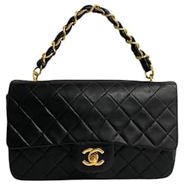 Chanel-Bolsa de mão Chanel CC Matelassé com aba de couro em muito bom estado-Outro