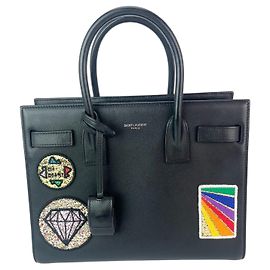 Borsa a tracolla Saint Laurent Sac De Jour con patch impreziosite in pelle nera Nero