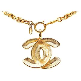 Chanel-Collier pendentif matelassé avec logo CC Chanel Collier en métal en bon état-Doré