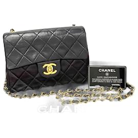 Chanel-Sac à bandoulière en cuir Chanel Mini Classic Single Flap en très bon état-Noir