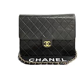 Chanel-Sac à bandoulière en cuir Chanel CC Matelassé en très bon état-Noir