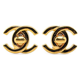 Chanel-Boucles d'oreilles clip Chanel CC Turnlock Boucles d'oreilles en métal en bon état-Doré