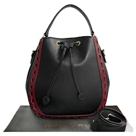 Yves Saint Laurent-Yves Saint Laurent Diamond Cut Leather Drawstring Bag Leather Handbag in Excellent condition-Black