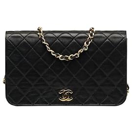 Chanel-Sac à épaule Chanel Matelassé Coco Push Lock en cuir en bon état-Noir