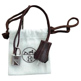 Hermès-bell, zipper and lock hermès new for hermès bag dustbag-Brown