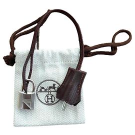 campanella, cerniera e lucchetto hermès nuovo per borsa hermès dustbag Marrone