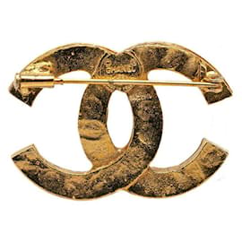 Chanel-Broche en métal avec logo CC en strass Chanel en bon état-Doré