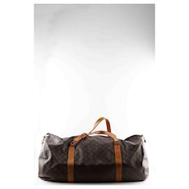 Louis Vuitton-Leather travel bag-Brown