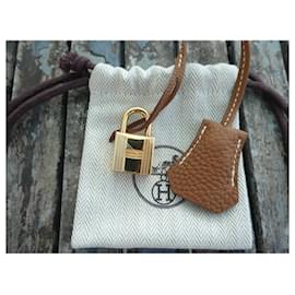 Hermès-bell, pull tab and new hermès togo leather gold kelly birkin lock-Camel