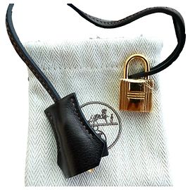 bell, pull tab, new Hermès padlock for Kelly or Birkin handbag Brown Dark brown