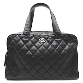 Chanel-Sac à main en cuir caviar matelassé Chanel 6186246 en bon état-Noir