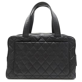 Chanel-Sac à main en cuir caviar matelassé Chanel 6186246 en bon état-Noir