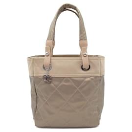 Chanel-Sac tote en toile Chanel Paris Biarritz PM 11888547 en bon état-Doré