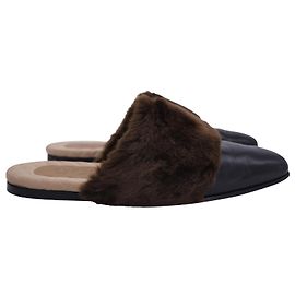 Mules Gucci em couro preto e marrom e pelúcia sintética Preto