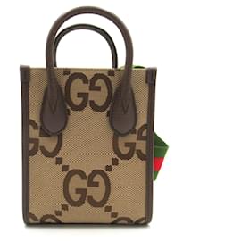 Gucci-Bolso tote mini de lona Gucci Jumbo GG 699406 en excelente estado-Castaño