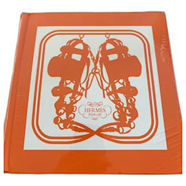 Hermès pop-up book under film Orange