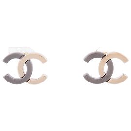 ORECCHINI CHANEL LOGO CC BICOLOR METALLO NERO E ORO D'oro