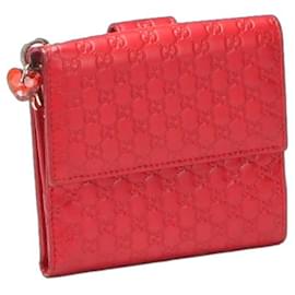 Gucci-Portafoglio bifold in pelle Microguccissima di Gucci, portafoglio corto in pelle 282579 in ottime condizioni-Altro